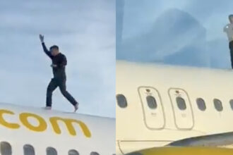 Чоловік на даху літака Airbus A320 компанії Vueling в аеропорту Валенсії