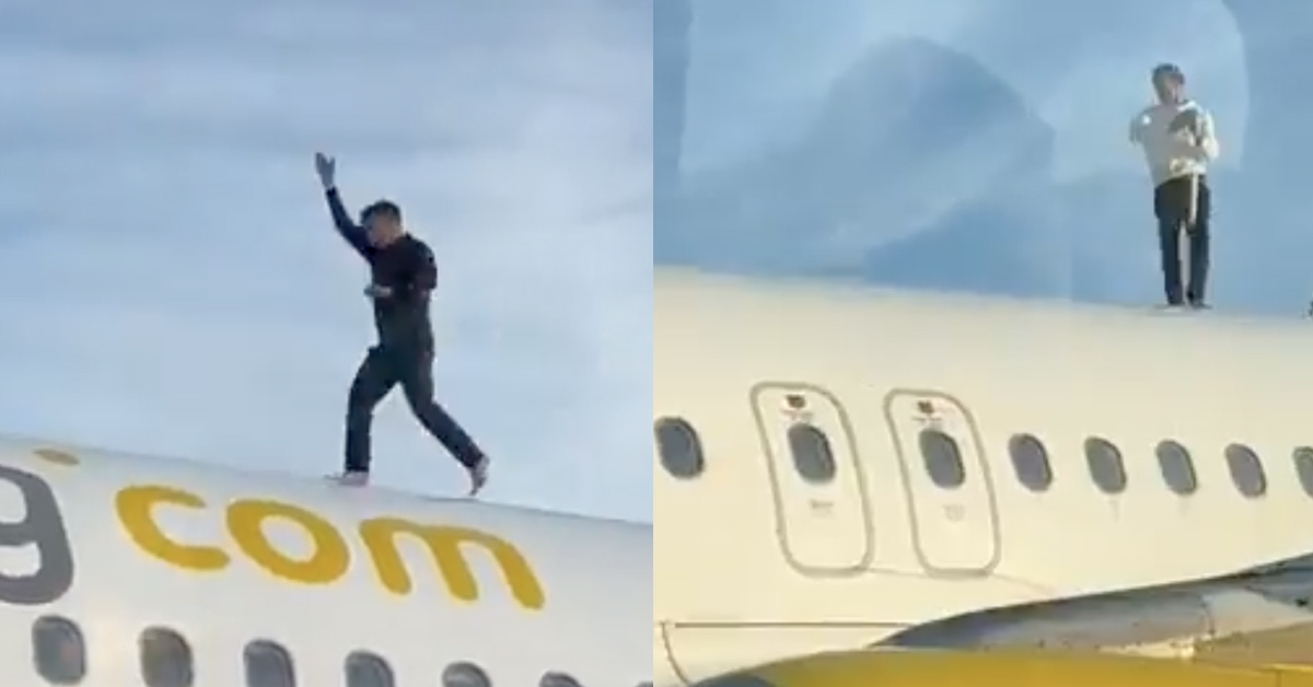 Чоловік на даху літака Airbus A320 компанії Vueling в аеропорту Валенсії